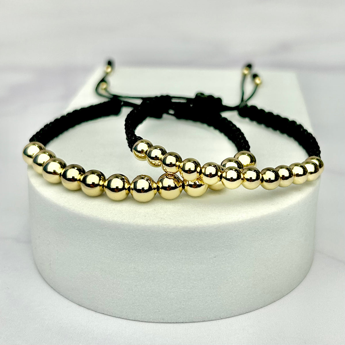 Combo de Pulseras Full Balín Liso Dorado Negras