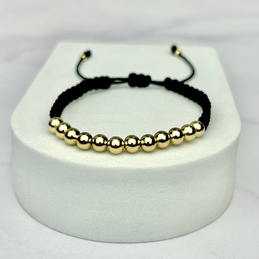 Pulsera Tejida Balín Liso Dorado Negra