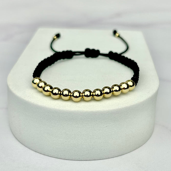 Pulsera Tejida Balín Liso Dorado Negra