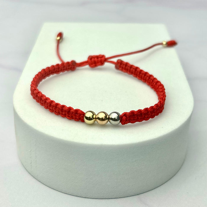 Pulsera Tejida Tres Oros Balín Liso Roja