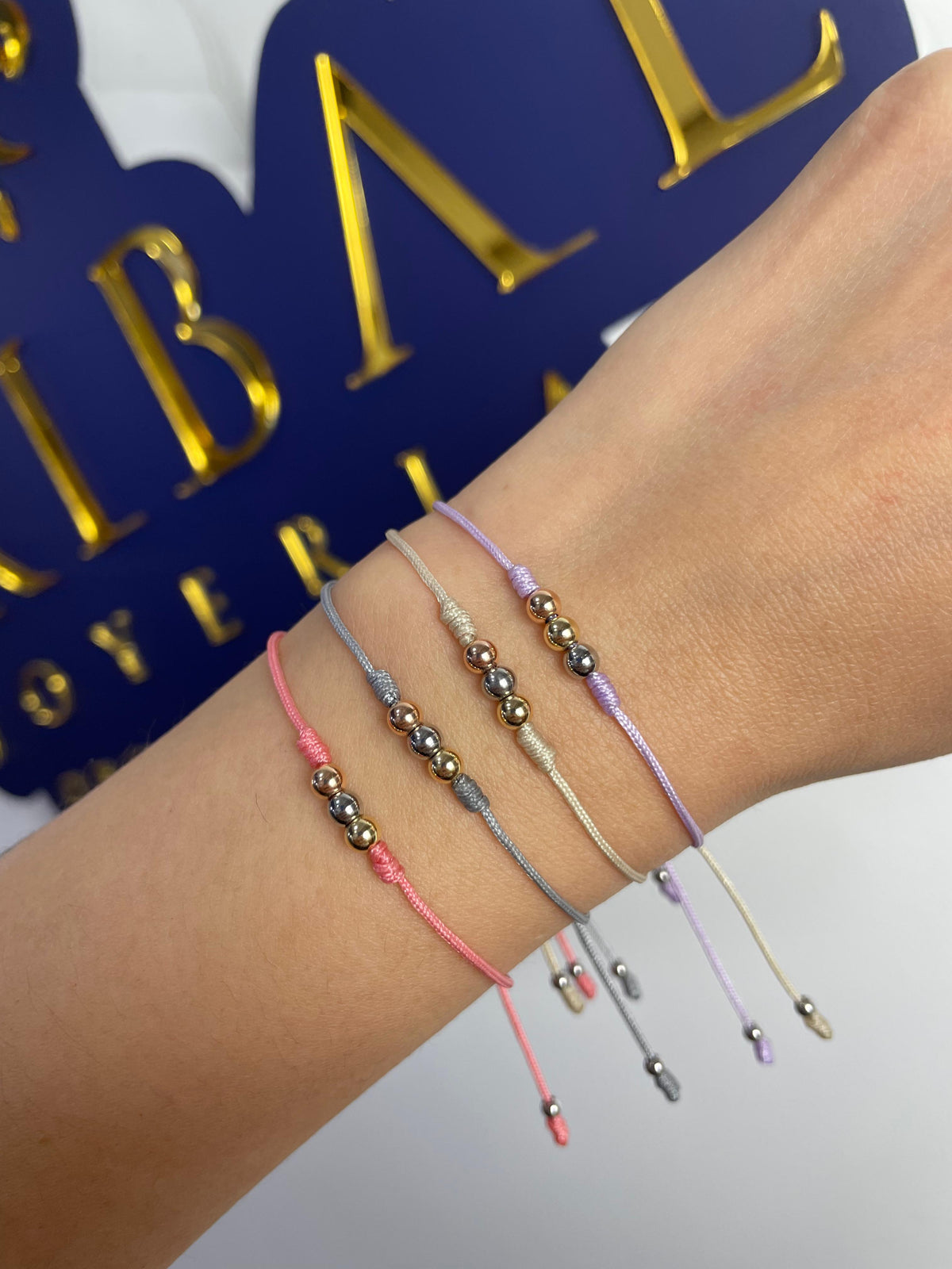 Pulsera 3 Oros Especial en Hilo Oro Laminado 18 K Lila